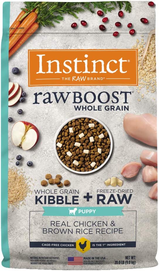 A bag of Instinct Raw Boost kibble with real raw chicken and rice, a high-protein and nutritious meal for your furry friend.